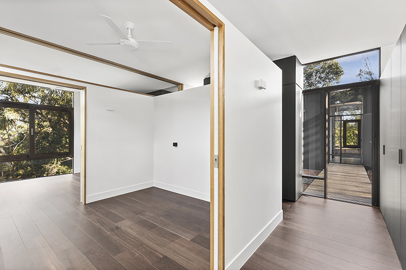 Sliding timber doors at ARKit's Three Pavilions house